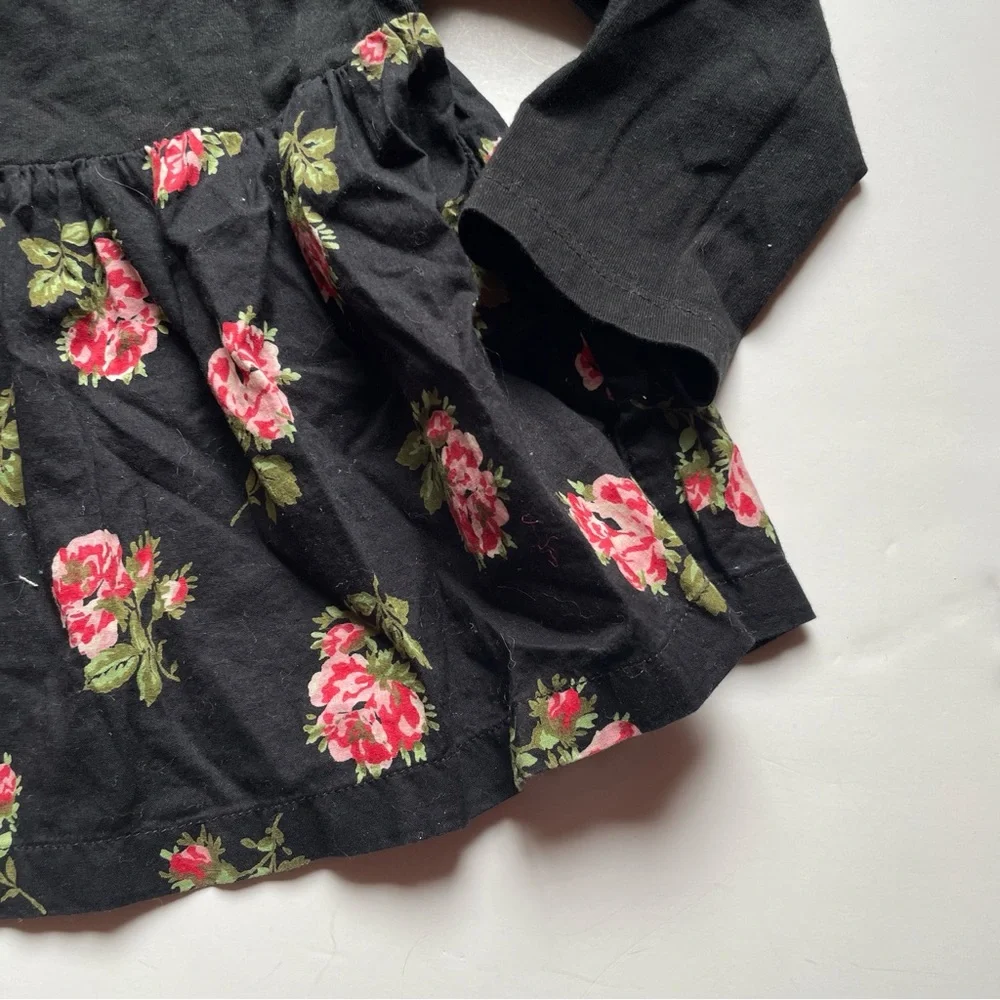 GAP Black floral peplum Top